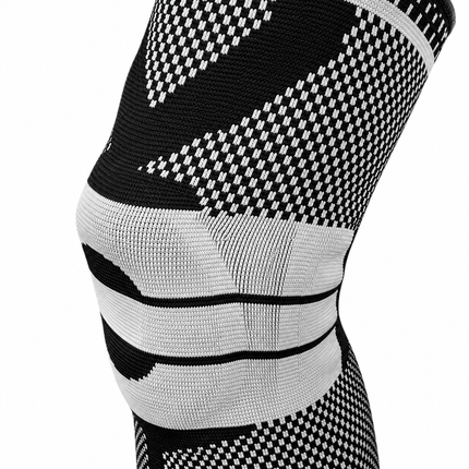 Close-up of the knee sleeve's black and gray knit fabric and patella panel